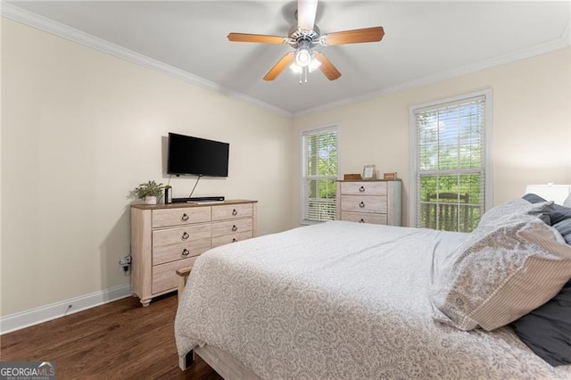 bedroom with baseboards, a ceiling fan, dark wood-style flooring, and crown molding