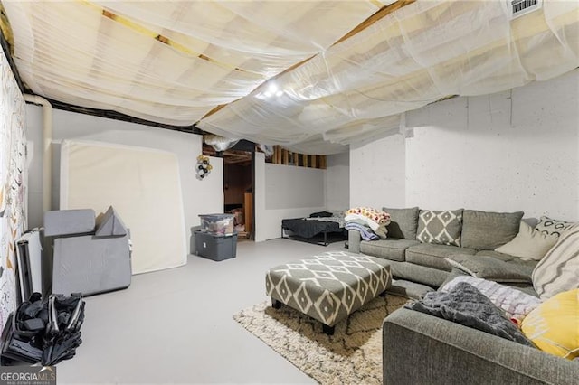 interior space with visible vents and finished concrete floors