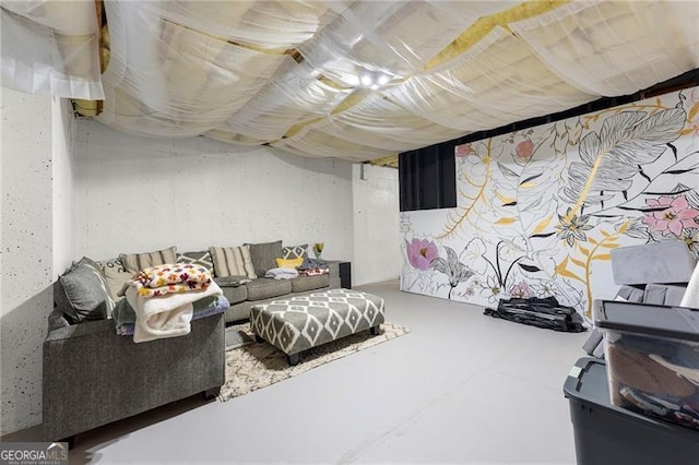 living room featuring finished concrete floors