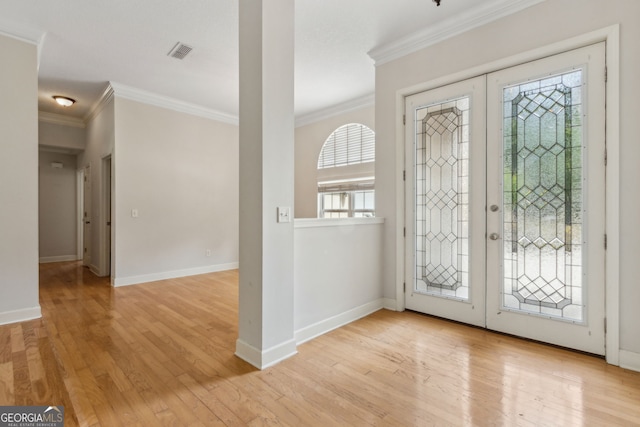 268 Osprey Cir, Saint Marys, GA 31558 - entryway featuring ornamental molding, visible vents, and french doors