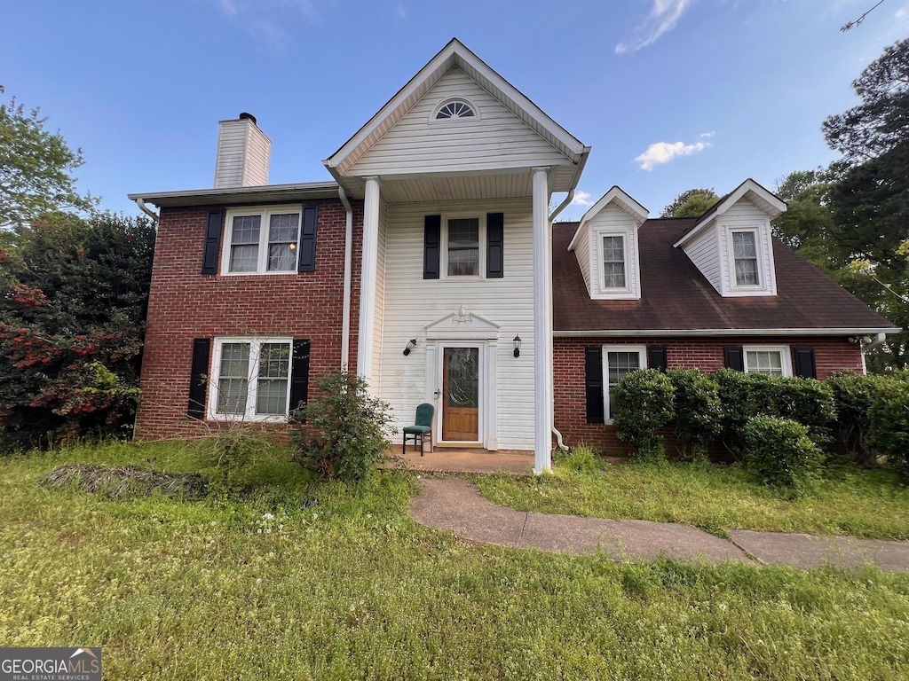 11 Lakeview Ln, Stockbridge, GA 30281 - greek revival house with a chimney and brick siding