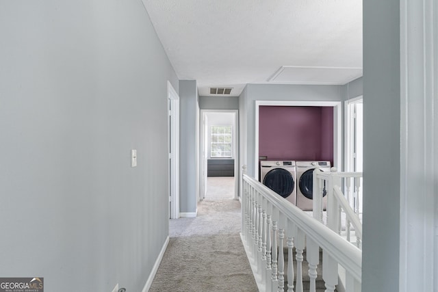 1914 Phillips Lake Blf, Lithonia, GA 30058 - hall with independent washer and dryer, carpet floors, attic access, baseboards, and visible vents
