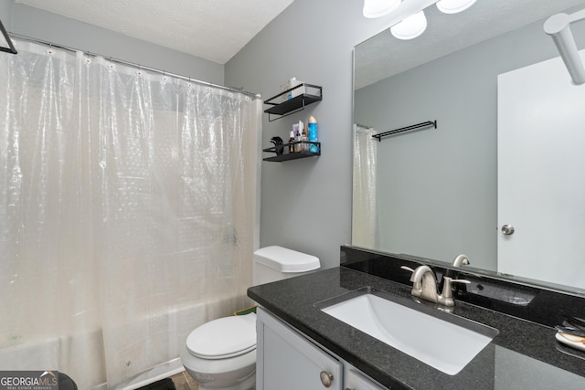 1914 Phillips Lake Blf, Lithonia, GA 30058 - full bath with vanity, toilet, a textured ceiling, and shower / bath combination with curtain