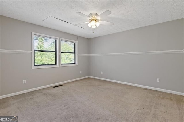 4811 Nevilly Way, Marietta, GA 30066 - carpeted spare room with a textured ceiling, visible vents, a ceiling fan, and baseboards