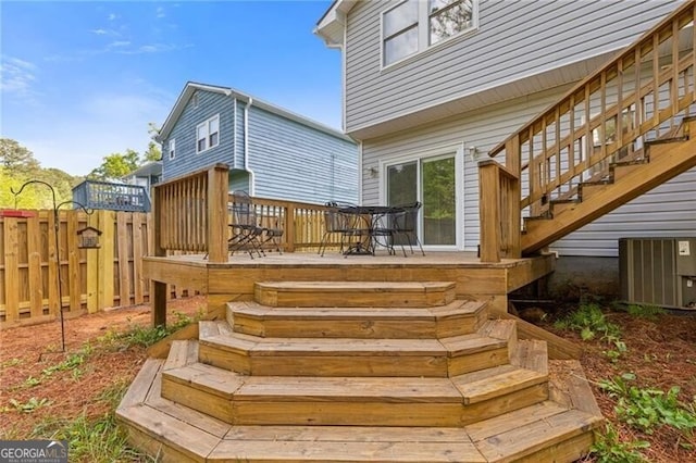 4811 Nevilly Way, Marietta, GA 30066 - wooden deck featuring central AC, stairway, and fence
