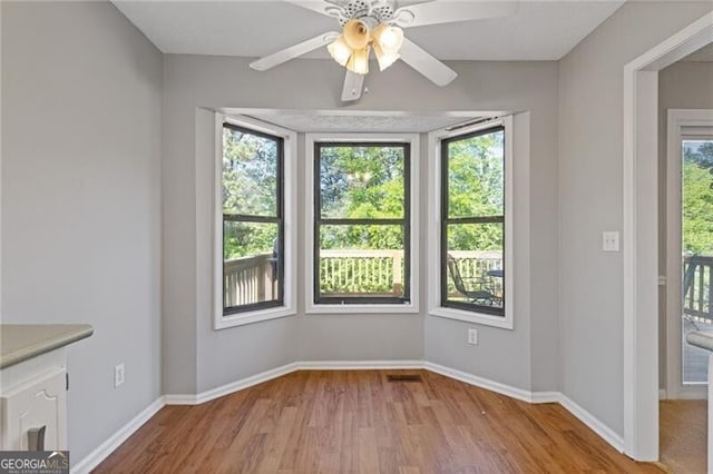 4811 Nevilly Way, Marietta, GA 30066 - interior space featuring a ceiling fan, visible vents, wood finished floors, and baseboards
