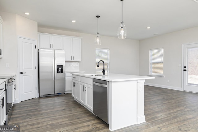 432 Cantrell Dr, Dallas, GA 30157 - kitchen featuring appliances with stainless steel finishes, dark wood-type flooring, light countertops, and a sink