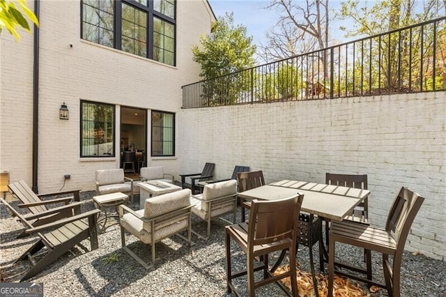 view of patio / terrace featuring an outdoor hangout area and outdoor dining space