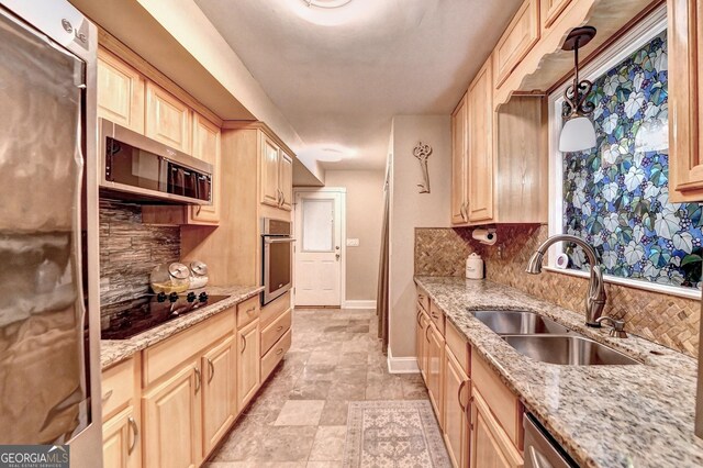 4364 Saddlecreek Ct, Auburn, GA 30011 - kitchen with light brown cabinetry, appliances with stainless steel finishes, decorative backsplash, and a sink