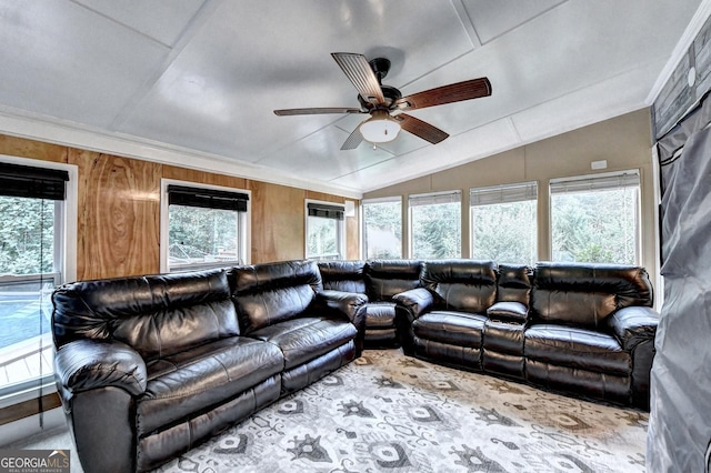 4364 Saddlecreek Ct, Auburn, GA 30011 - living area featuring wood walls, a ceiling fan, crown molding, and lofted ceiling
