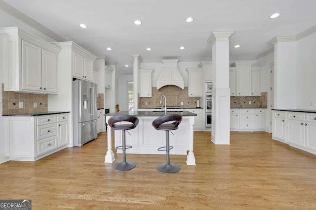 2932 Springbluff Ln, Buford, GA 30519 - bathroom featuring wood finished floors, vanity, and baseboards