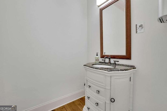 2932 Springbluff Ln, Buford, GA 30519 - bathroom with baseboards, a walk in closet, and vanity