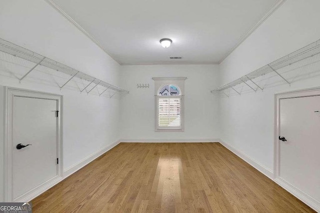 2932 Springbluff Ln, Buford, GA 30519 - full bathroom featuring crown molding, two vanities, a sink, and visible vents