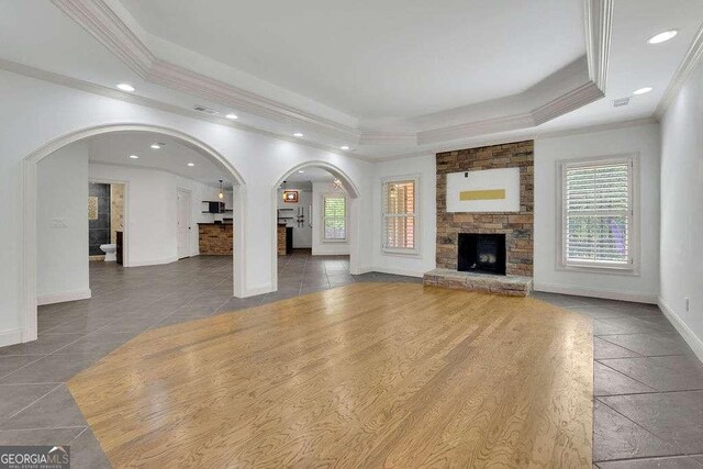 2932 Springbluff Ln, Buford, GA 30519 - empty room with crown molding, recessed lighting, and arched walkways