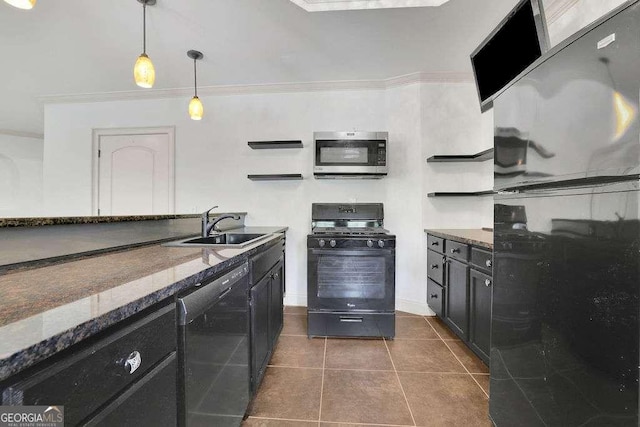 2932 Springbluff Ln, Buford, GA 30519 - kitchen with refrigerator, stainless steel microwave, black gas stove, a sink, and dishwashing machine