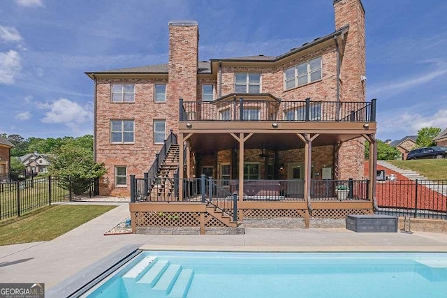 2932 Springbluff Ln, Buford, GA 30519 - view of swimming pool featuring a deck, fence, a fenced in pool, a patio, and stairs