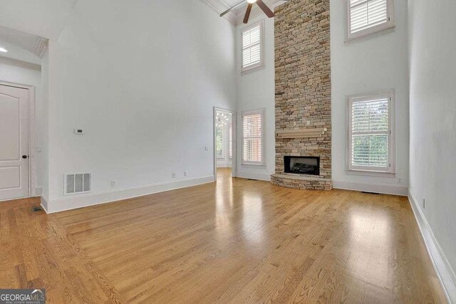 2932 Springbluff Ln, Buford, GA 30519 - stairs with a wealth of natural light, wood finished floors, a ceiling fan, and a high ceiling