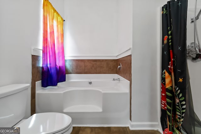 full bathroom with toilet, a bath, tile patterned flooring, and a shower with shower curtain