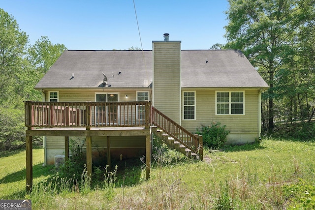 140 Spring Cir, Senoia, GA 30276 - back of house with a deck, a yard, stairs, and a chimney
