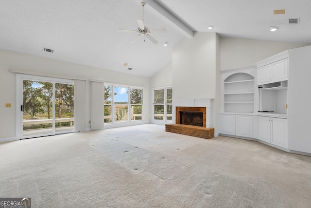 45 Herons Nest, Savannah, GA 31410 - unfurnished living room with light colored carpet, ceiling fan, a fireplace, visible vents, and high vaulted ceiling
