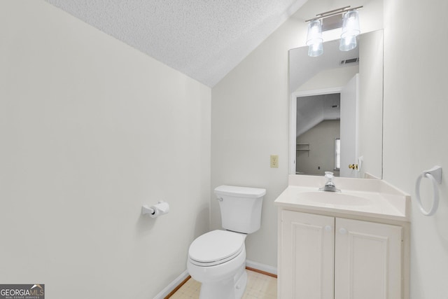 45 Herons Nest, Savannah, GA 31410 - bathroom featuring vanity, toilet, visible vents, vaulted ceiling, and a textured ceiling