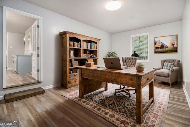 898 Doeskin Dr NW, Conyers, GA 30012 - office space featuring light wood-style floors and baseboards