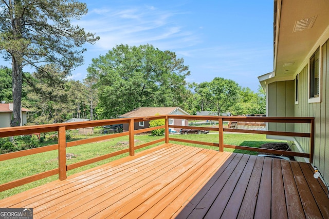 898 Doeskin Dr NW, Conyers, GA 30012 - deck with a lawn and view of scattered trees