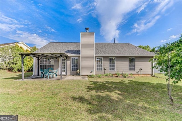 2602 Midler Ct, Buford, GA 30519 - rear view of house featuring a patio area, a yard, a chimney, and a pergola