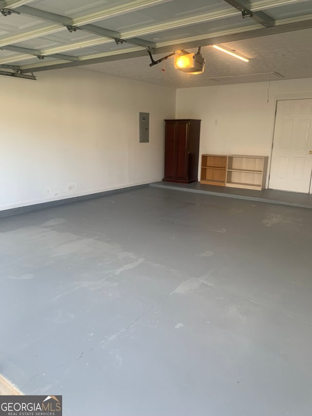 2602 Midler Ct, Buford, GA 30519 - garage with electric panel and a garage door opener