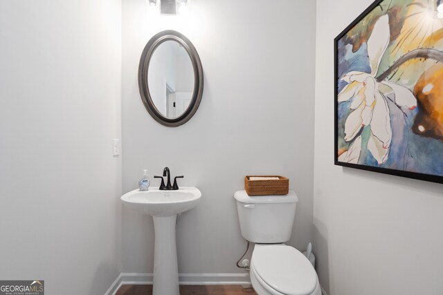 1027 Victoria Heights Dr, Dallas, GA 30132 - half bath featuring toilet and wood finished floors