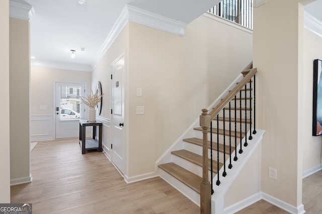 1027 Victoria Heights Dr, Dallas, GA 30132 - stairs with ornamental molding and wood finished floors