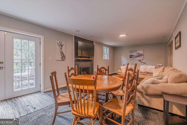 20 Mitchell Cir SE, Rome, GA 30161 - dining area featuring a brick fireplace and light colored carpet