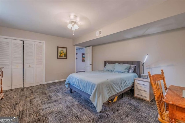 20 Mitchell Cir SE, Rome, GA 30161 - carpeted bedroom with a closet and ceiling fan