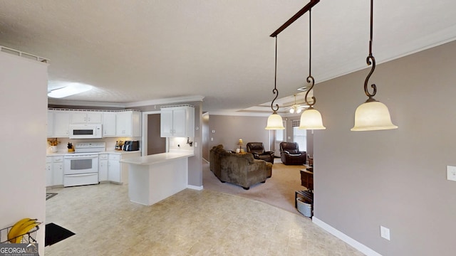 kitchen with white appliances, crown molding, light countertops, white cabinets, and open floor plan