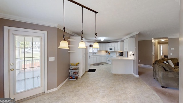 kitchen with white appliances, white cabinetry, light countertops, ornamental molding, and open floor plan