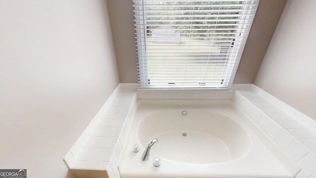 bathroom featuring a bath