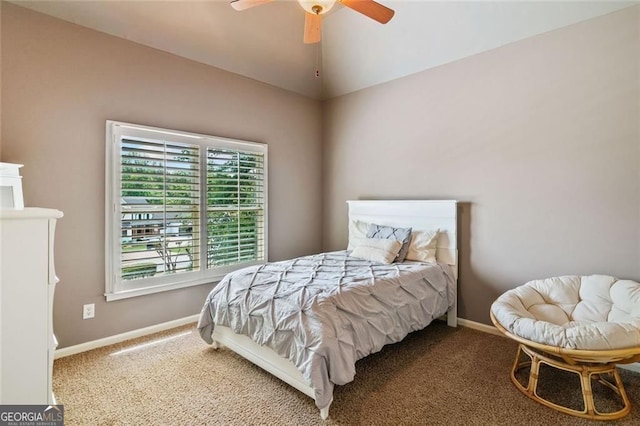 carpeted bedroom featuring a ceiling fan and baseboards