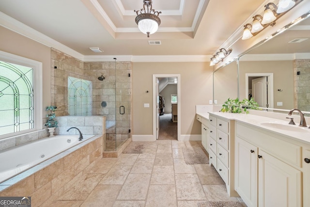 full bath featuring a garden tub, visible vents, a shower stall, vanity, and a raised ceiling