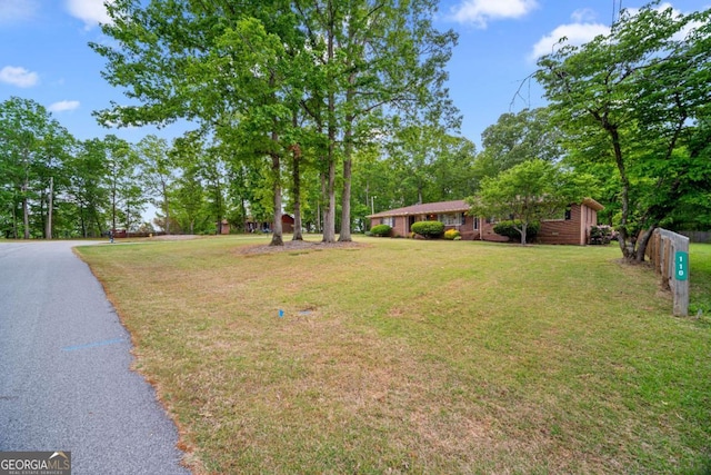 110 Otelia Ln, Covington, GA 30014 - exterior space with a front lawn