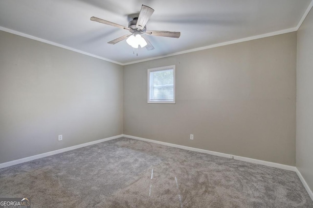 unfurnished room featuring baseboards, ceiling fan, carpet floors, and crown molding