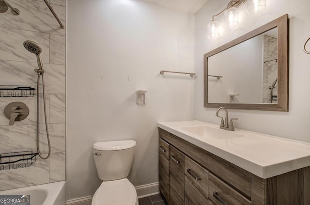 full bath featuring toilet,  shower combination, vanity, and baseboards