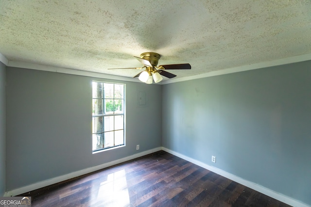 spare room featuring a textured ceiling, a ceiling fan, baseboards, and dark wood-type flooring