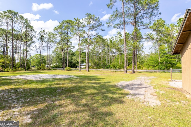 view of yard with fence