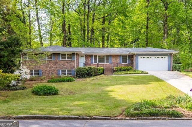 2558 Landeau Cir, Tucker, GA 30084 - ranch-style home featuring a garage, brick siding, a front lawn, and concrete driveway