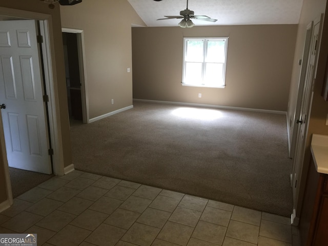 3875 Grand Prix St, Cumming, GA 30041 - spare room featuring visible vents, ceiling fan, vaulted ceiling, and wood finished floors