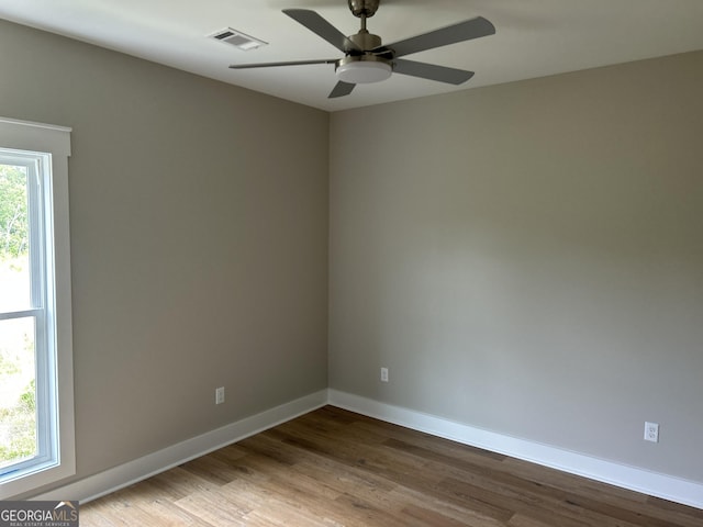 1159 Paris Ave, Swainsboro, GA 30401 - empty room with a ceiling fan, baseboards, and wood finished floors