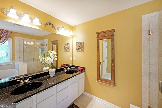 718 Province Pl SE, Atlanta, GA 30312 - full bath featuring a stall shower, double vanity, tile patterned floors, and a bath