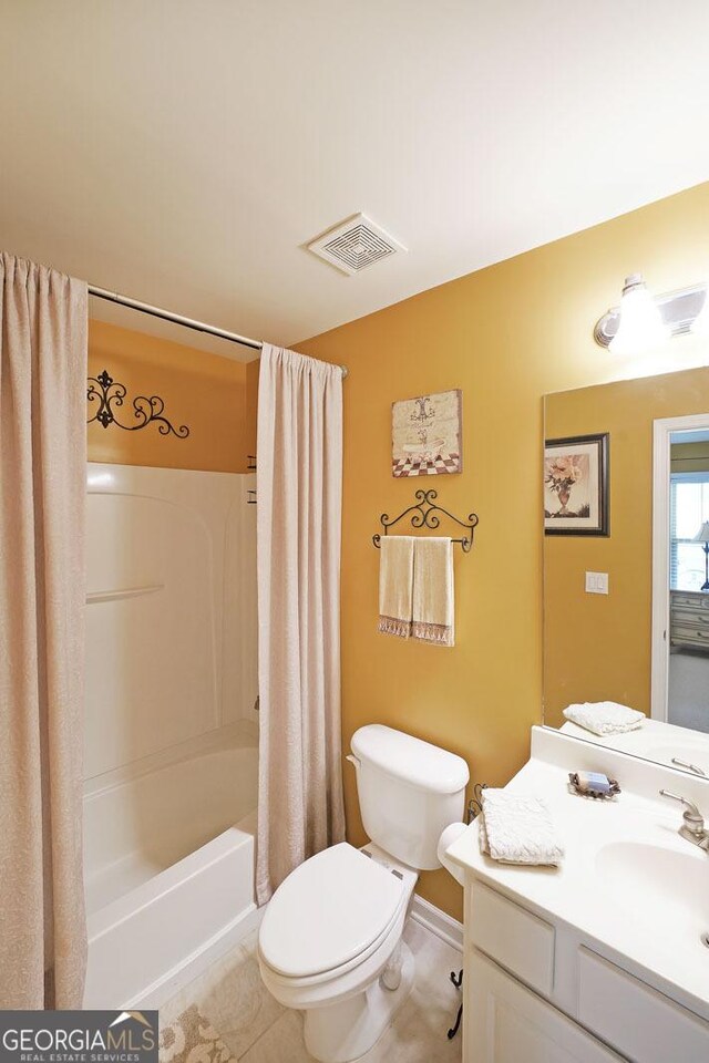 718 Province Pl SE, Atlanta, GA 30312 - bedroom with light colored carpet, a chandelier, and multiple windows