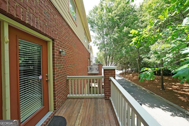 718 Province Pl SE, Atlanta, GA 30312 - living area featuring a chandelier, light wood-type flooring, and baseboards