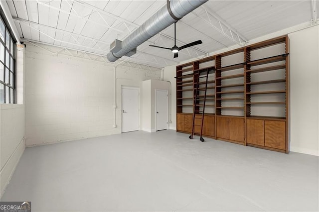 830 Dekalb Ave Unit 1, Atlanta, GA 30307 - garage with ceiling fan and concrete block wall
